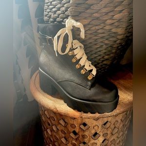 Never worn, Black heeled combat style boot